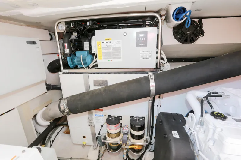  Yacht Photos Pics Engine room of 2019 Azimut Magellano 53 yacht, featuring Dometic equipment and various components.