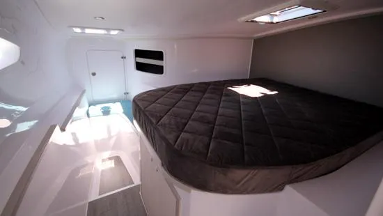 Pepper Love Yacht Photos Pics Interior cabin of 2020 Seawind 1190 Sport catamaran with a cozy bed.