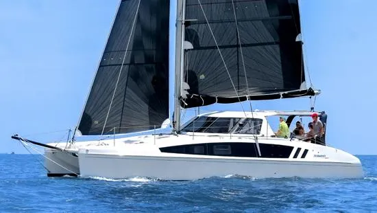 Pepper Love Yacht Photos Pics 2020 Seawind 1190 Sport catamaran sailing on open water.