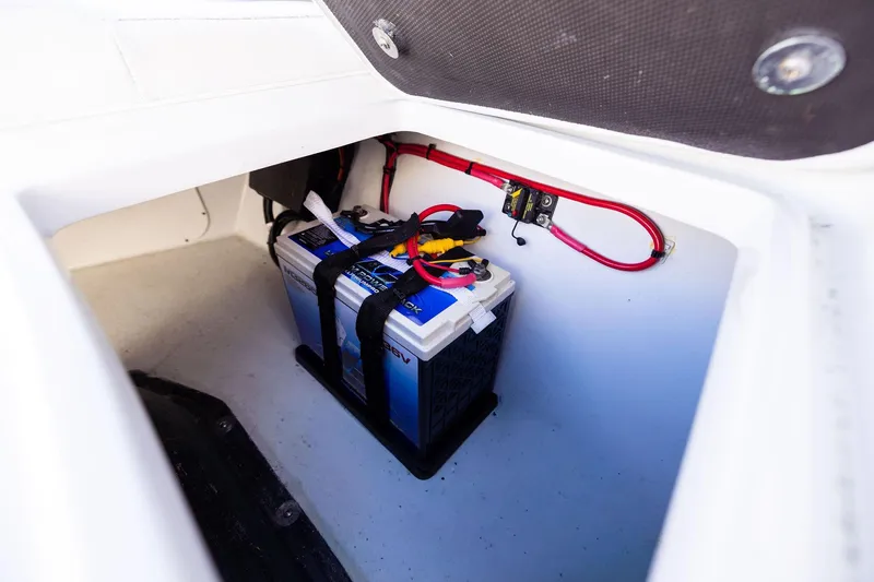  Yacht Photos Pics 2023 Yellowfin 32 Offshore boat battery compartment with secured wiring.