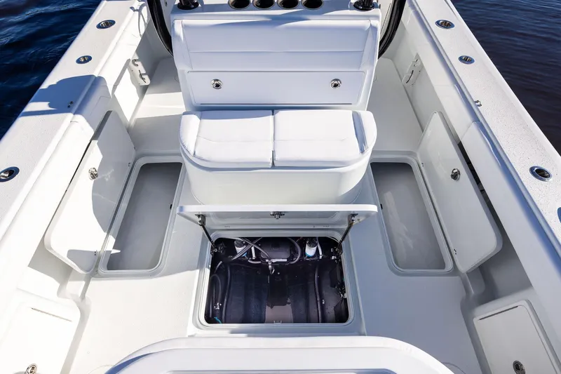  Yacht Photos Pics 2023 Yellowfin 32 Offshore boat interior with open storage compartments.