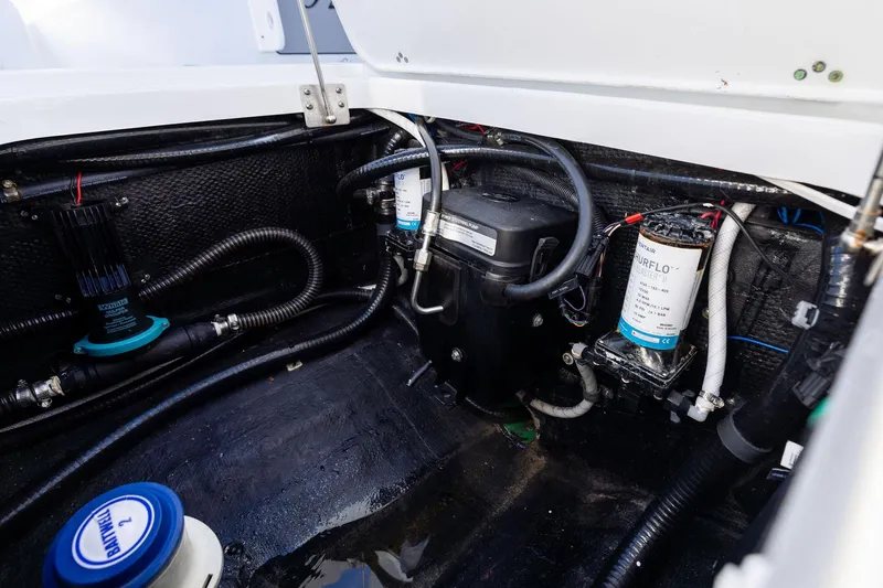  Yacht Photos Pics 2023 Yellowfin 32 Offshore boat engine compartment with wiring and components.