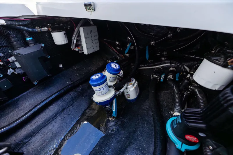  Yacht Photos Pics 2023 Yellowfin 32 Offshore boat engine compartment with wiring and components.