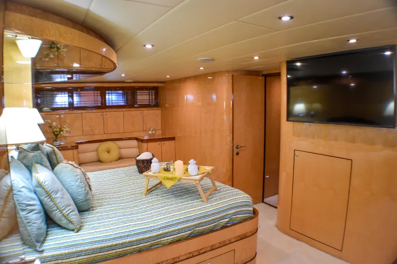Magic Moments Yacht Photos Pics Luxurious 2006 Johnson Country Kitchen yacht bedroom with modern decor and large TV.