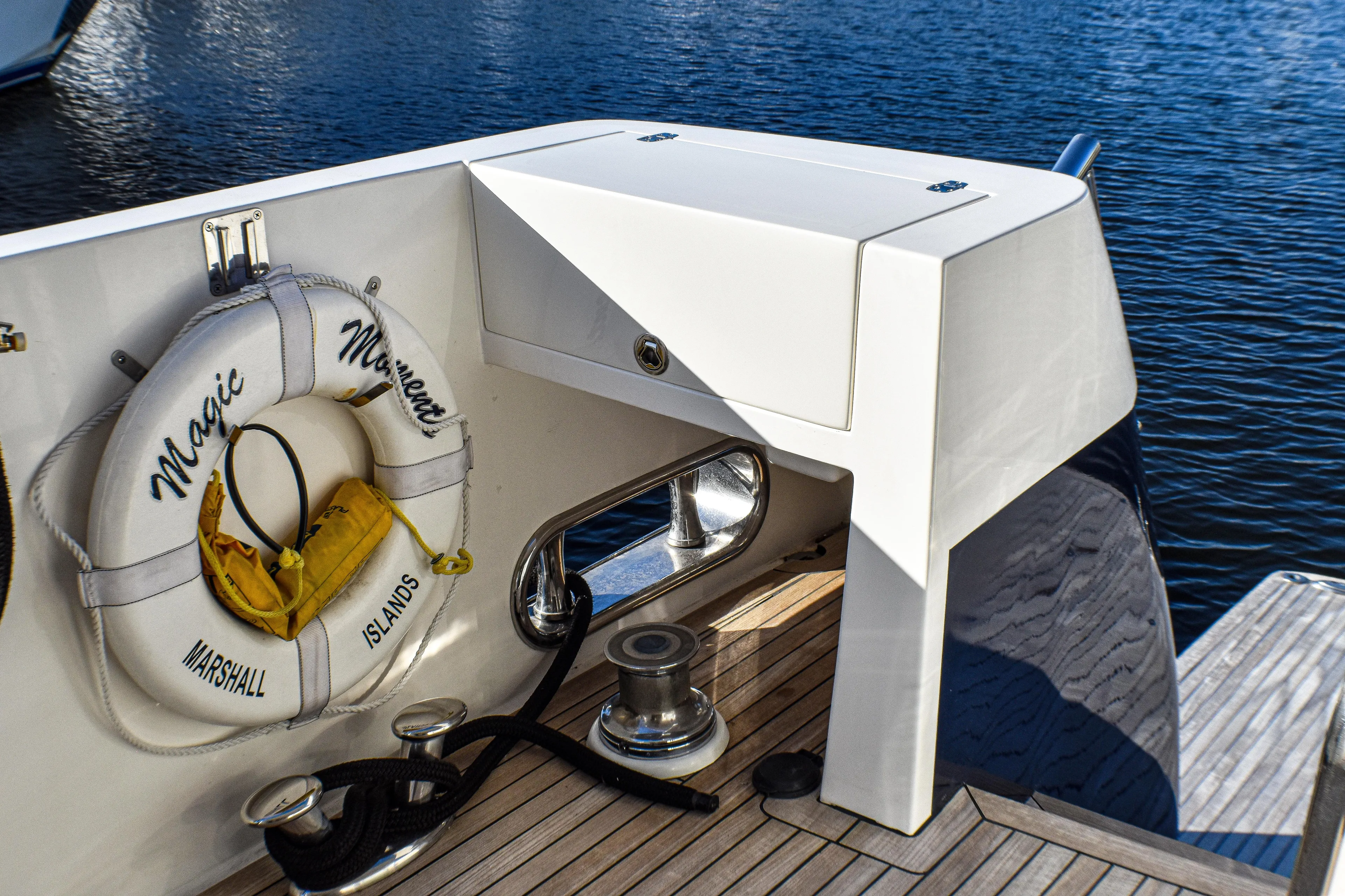 Magic Moments Yacht Photos Pics 2006 Johnson Country Kitchen yacht deck with life preserver and nautical equipment.
