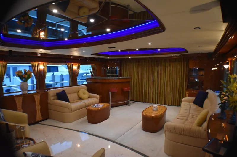 Magic Moments Yacht Photos Pics Luxurious yacht interior with plush seating, bar area, and ambient lighting, Johnson Country Kitchen 2006.