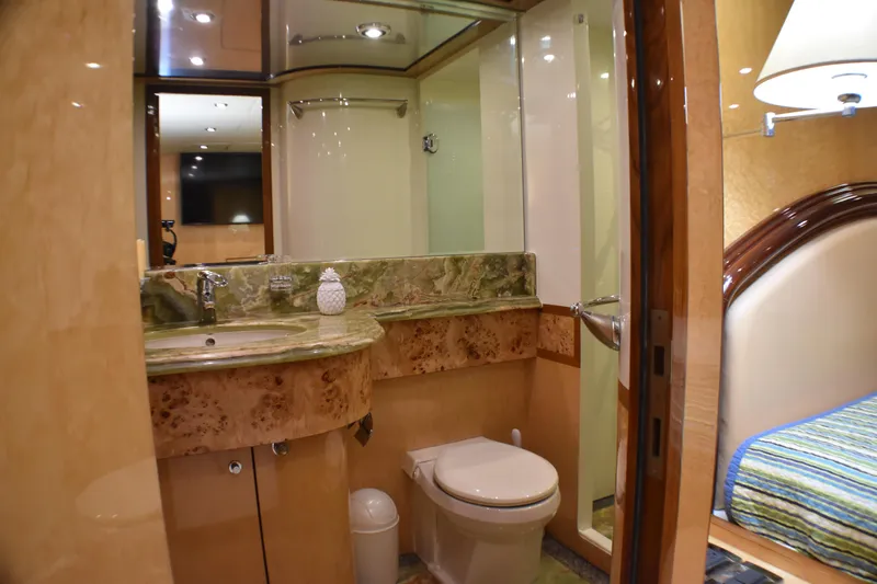 Magic Moments Yacht Photos Pics Luxurious yacht bathroom with marble countertop, shower, and modern fixtures, Johnson Country Kitchen 2006.