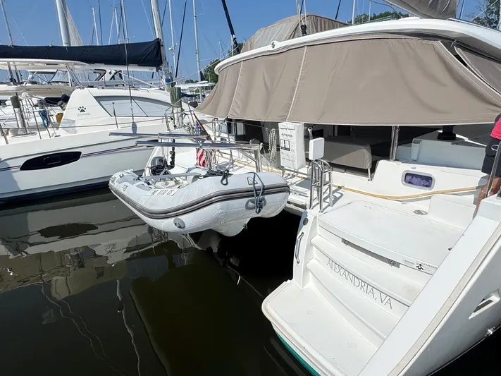 Serenity Yacht Photos Pics 2016 Lagoon 400 S2 catamaran docked with inflatable dinghy, Alexandria, VA.