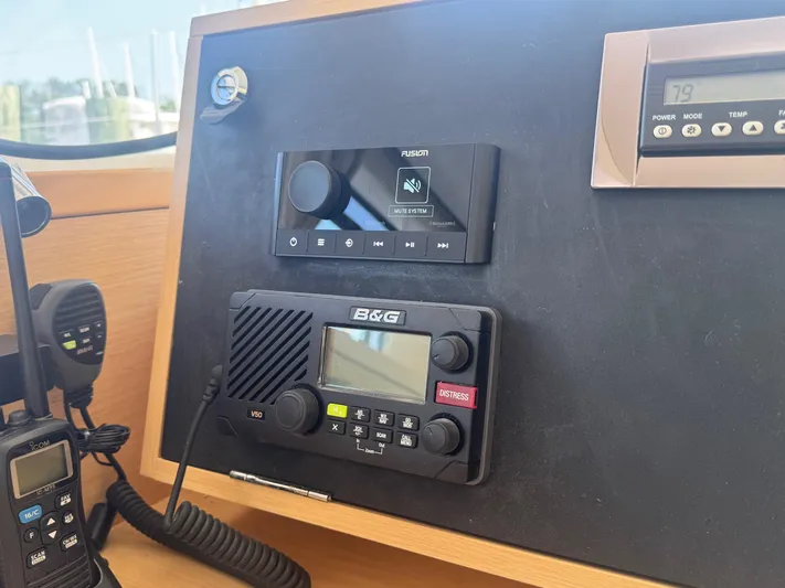 Serenity Yacht Photos Pics Control panel of a 2016 Lagoon 400 S2 yacht with communication devices.