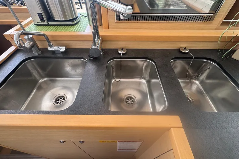 Serenity Yacht Photos Pics Triple stainless steel sinks in Lagoon 400 S2 catamaran kitchen, 2016 model.