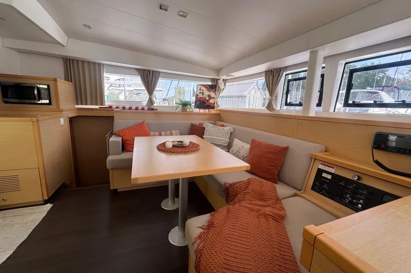 Serenity Yacht Photos Pics Interior of 2016 Lagoon 400 S2 catamaran with cozy seating and modern amenities.