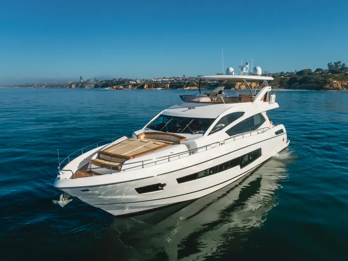 Agua Rancho Yacht Photos Pics Luxurious 2017 Sunseeker 75 Yacht cruising on calm waters under clear blue skies.