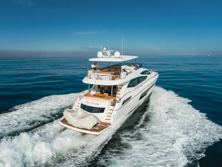 Agua Rancho Yacht Photos Pics 2017 Sunseeker 75 Yacht cruising on open water, showcasing luxury and performance.