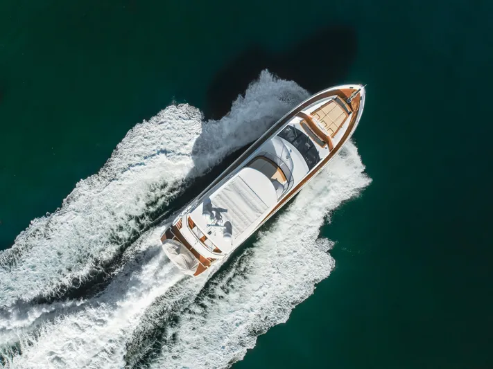 Agua Rancho Yacht Photos Pics Sunseeker 75 Yacht 2017 cruising on open water, aerial view.