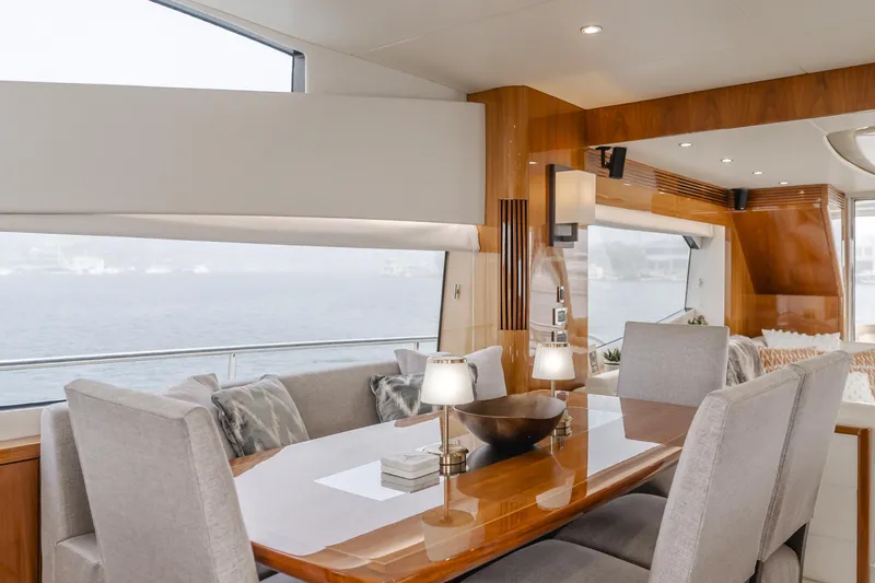 Agua Rancho Yacht Photos Pics Luxurious interior of 2017 Sunseeker 75 Yacht with elegant dining area and sea view.