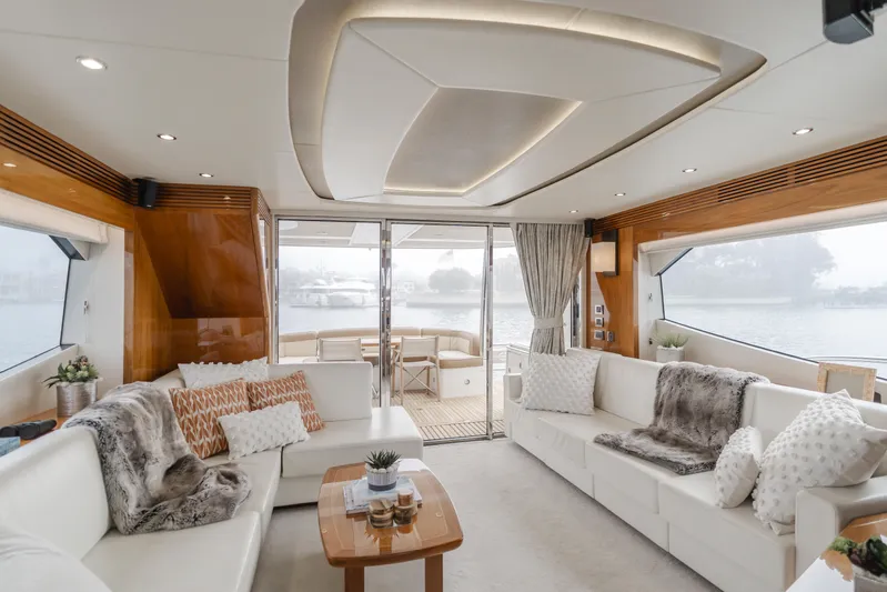 Agua Rancho Yacht Photos Pics Luxurious interior of 2017 Sunseeker 75 Yacht with elegant seating and panoramic windows.