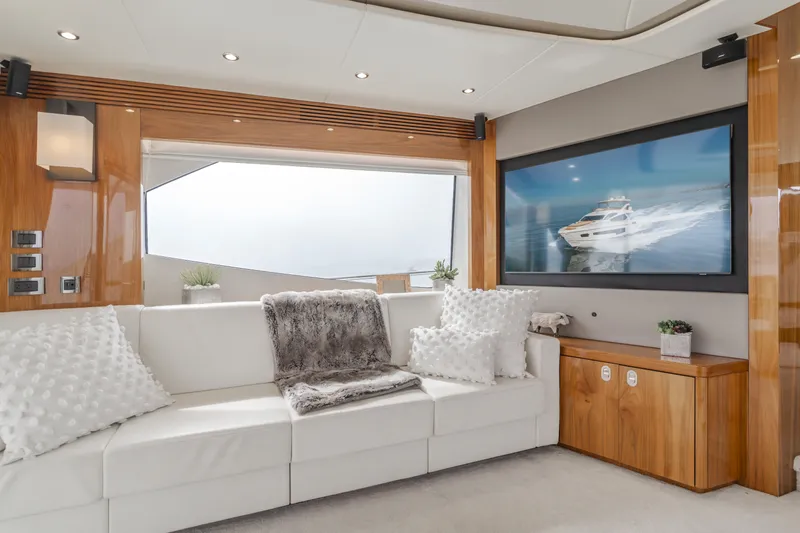 Agua Rancho Yacht Photos Pics Luxurious interior of 2017 Sunseeker 75 Yacht with plush seating and large window.