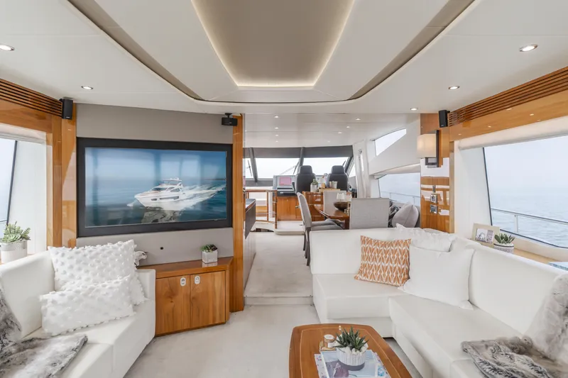 Agua Rancho Yacht Photos Pics Luxurious interior of a 2017 Sunseeker 75 Yacht with modern furnishings and large windows.