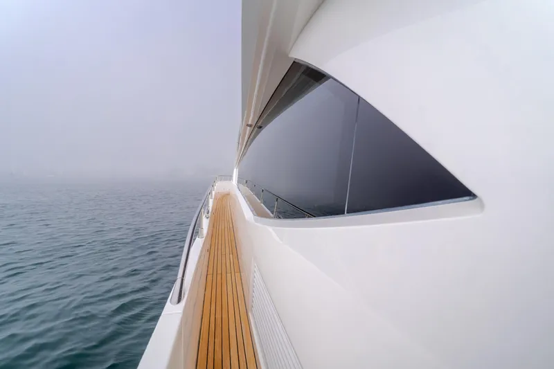 Agua Rancho Yacht Photos Pics Side view of 2017 Sunseeker 75 Yacht on calm water.