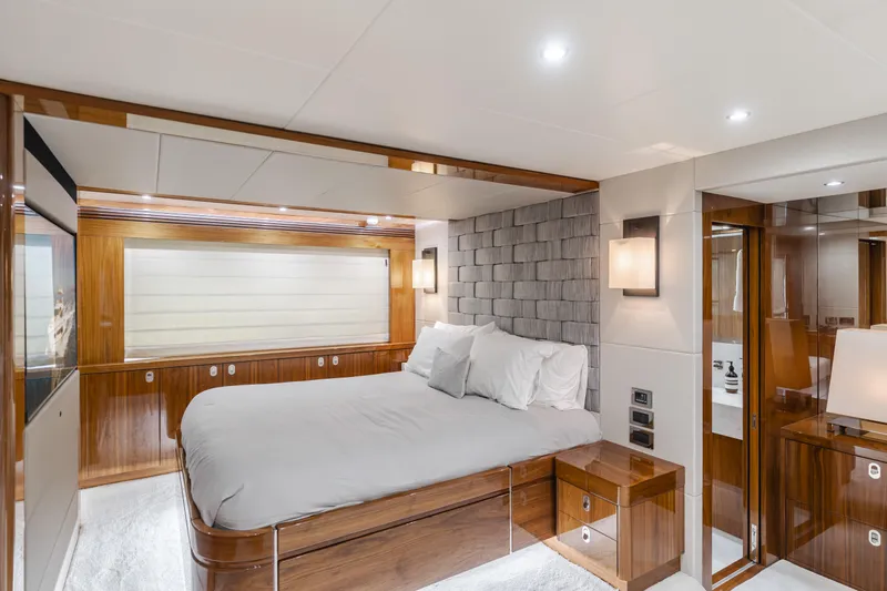 Agua Rancho Yacht Photos Pics Luxurious bedroom interior of 2017 Sunseeker 75 Yacht with modern design and elegant wood finishes.