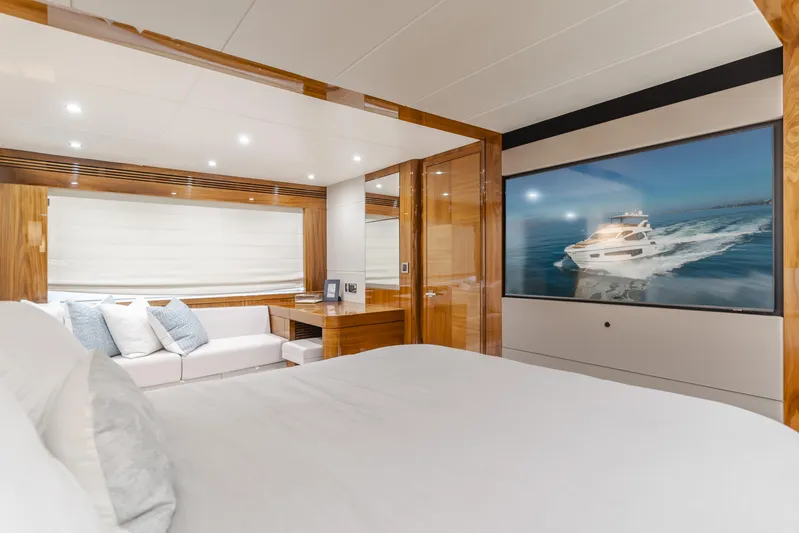 Agua Rancho Yacht Photos Pics Luxurious interior of 2017 Sunseeker 75 Yacht with elegant bedroom and large window.
