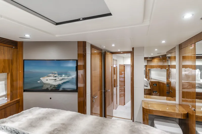 Agua Rancho Yacht Photos Pics Luxurious interior of a 2017 Sunseeker 75 Yacht, featuring elegant wood finishes and modern design.