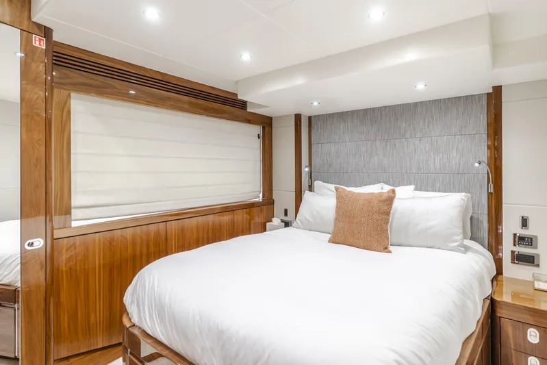 Agua Rancho Yacht Photos Pics Luxurious bedroom interior of 2017 Sunseeker 75 Yacht with elegant wood finishes.