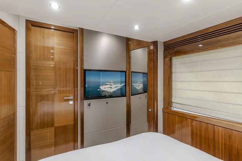 Agua Rancho Yacht Photos Pics Luxurious interior of 2017 Sunseeker 75 Yacht with wood paneling and modern design.