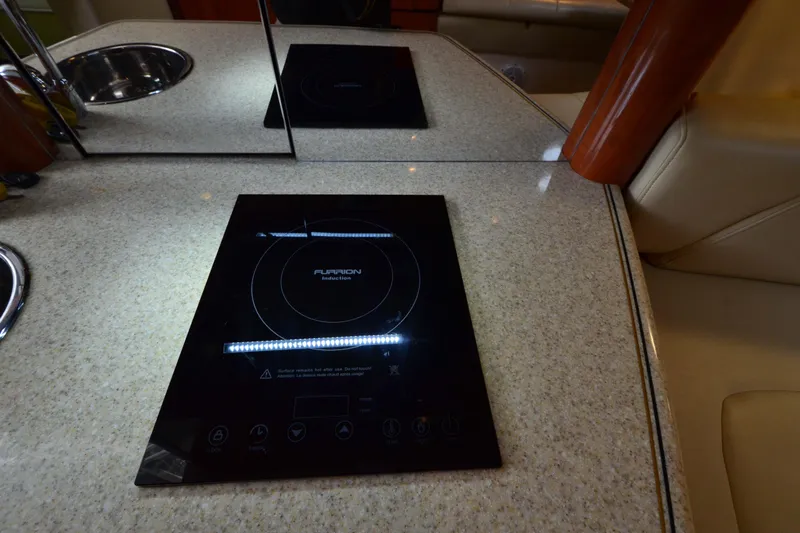 Flying Norseman II Yacht Photos Pics 2007 Fountain 38 Sportfish Cruiser OB kitchen with Furrion induction cooktop.