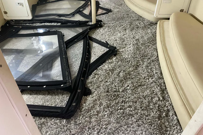 Flying Norseman II Yacht Photos Pics Interior of 2007 Fountain 38 Sportfish Cruiser OB with carpet and window panels.