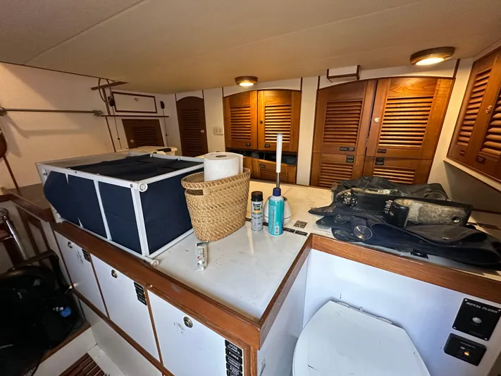 Miss Stephanie Yacht Photos Pics Interior of 2008 Marlow 70 Explorer yacht with storage and amenities.