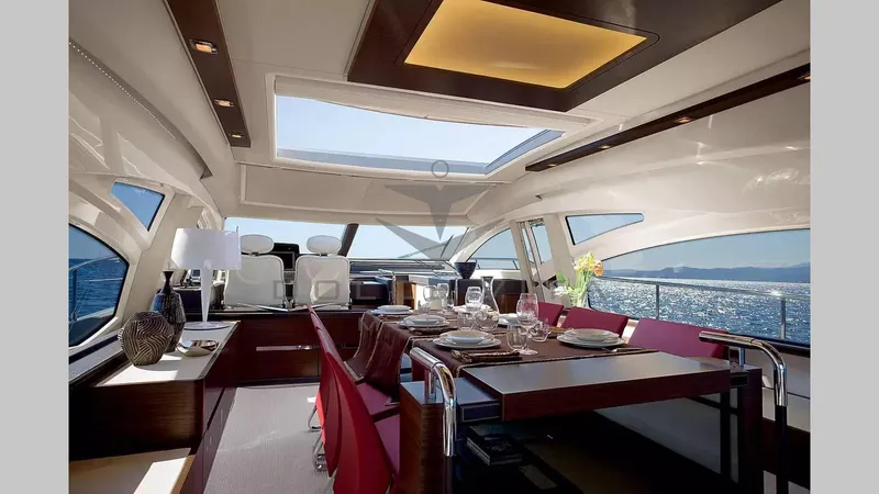  Yacht Photos Pics Luxurious interior of 2011 Azimut 72S yacht with elegant dining area and panoramic windows.