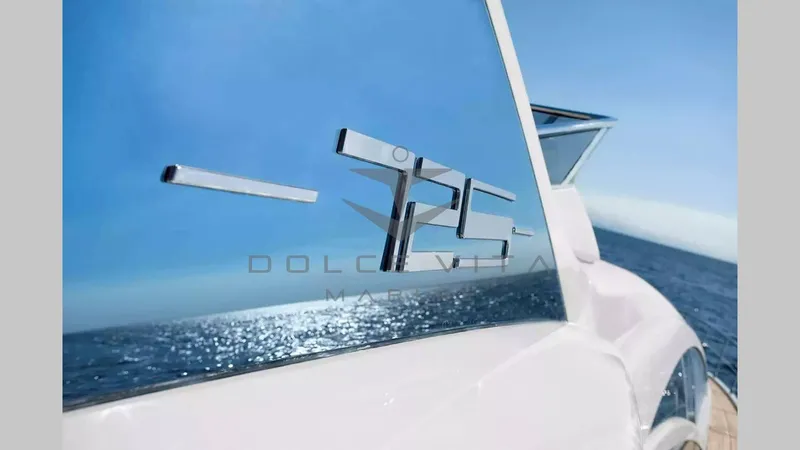  Yacht Photos Pics Azimut 72S yacht, 2011 model, reflecting sunlight on the ocean.