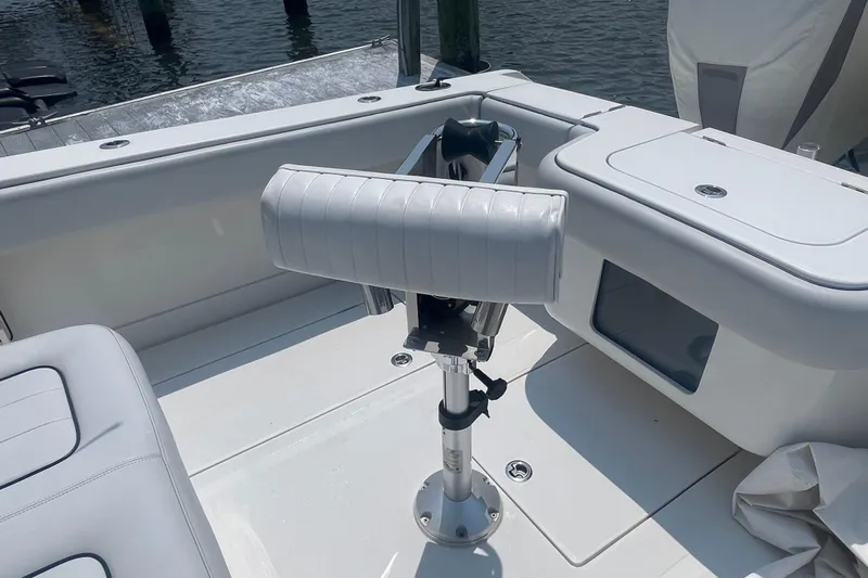  Yacht Photos Pics 2020 Jupiter 38 boat interior with white seating and storage compartments.