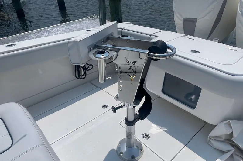  Yacht Photos Pics Fishing rod holder on a 2020 Jupiter 38 boat deck, near water.