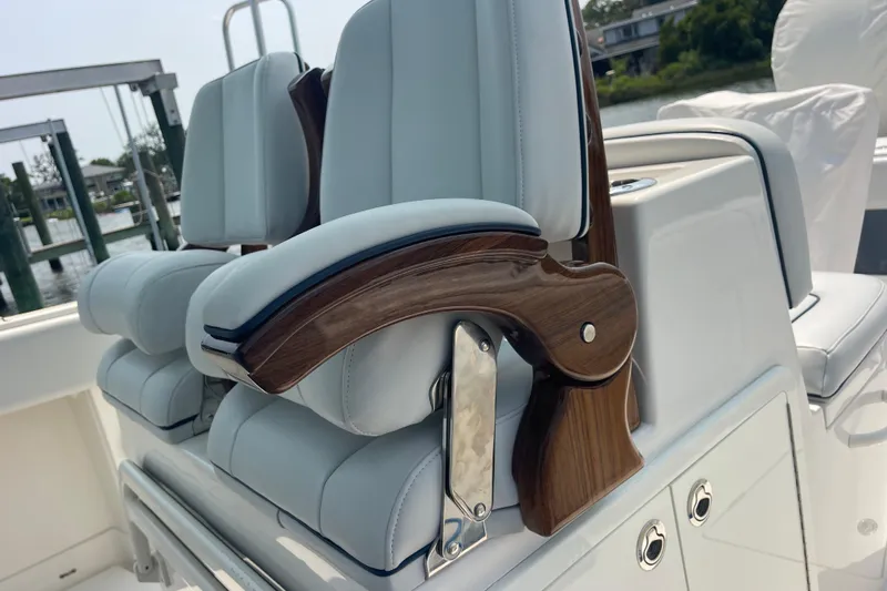  Yacht Photos Pics Luxury seating on a 2020 Jupiter 38 boat with elegant wood accents.