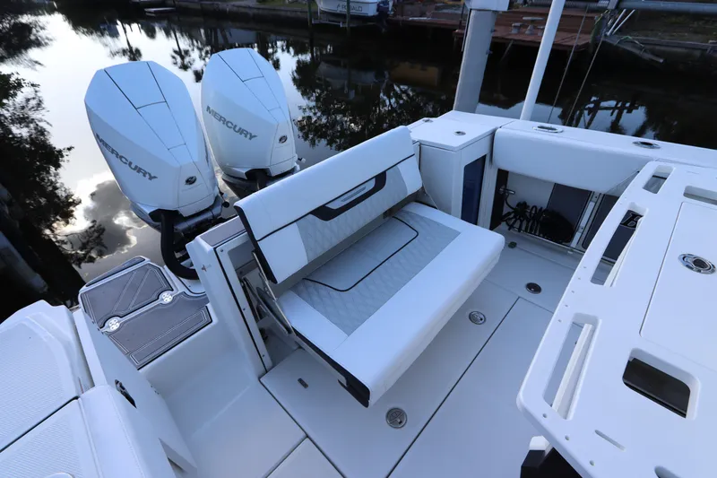  Yacht Photos Pics 2023 Blackfin 272 CC boat with dual Mercury engines and foldable seating.