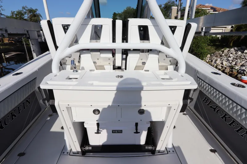  Yacht Photos Pics 2023 Blackfin 272 CC boat interior with seating and Yeti cooler.