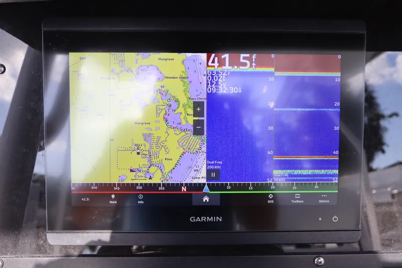  Yacht Photos Pics Garmin navigation display on 2023 Blackfin 272 CC boat, showing map and sonar data.
