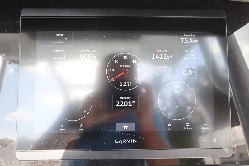  Yacht Photos Pics Garmin display on 2023 Blackfin 272 CC boat showing speed, fuel, and odometer readings.
