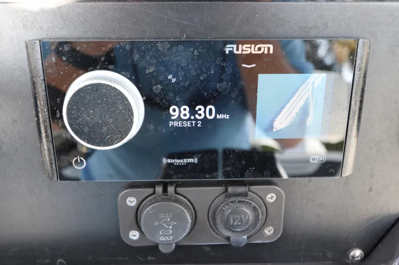 Yacht Photos Pics Fusion radio display on 2023 Blackfin 272 CC, showing 98.30 MHz frequency.