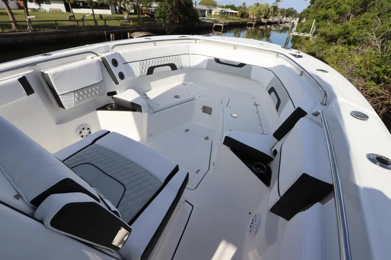  Yacht Photos Pics 2023 Blackfin 272 CC boat interior with spacious seating and modern design.