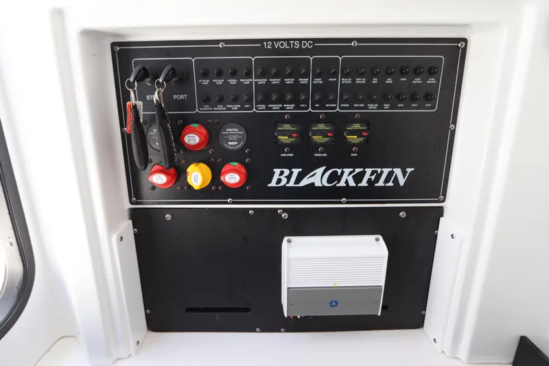  Yacht Photos Pics Control panel of 2023 Blackfin 272 CC boat with switches and labels.
