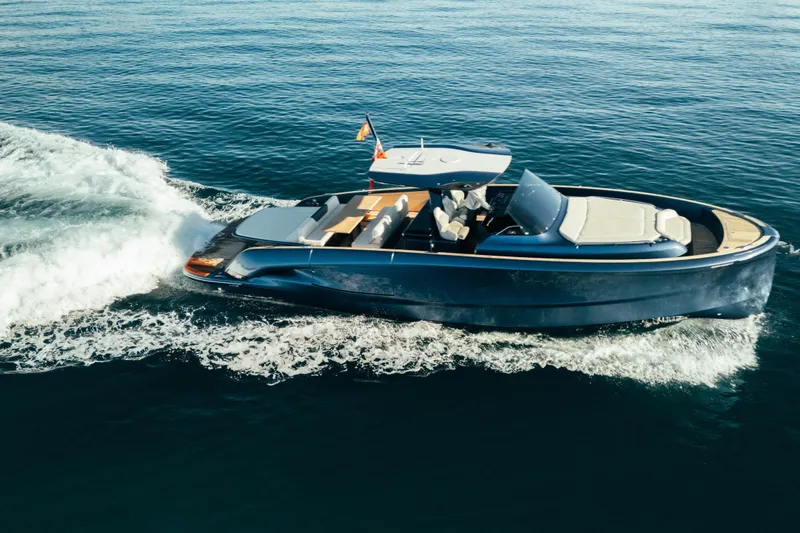  Yacht Photos Pics 2023 Solaris Power 44 Open yacht cruising on calm blue waters.