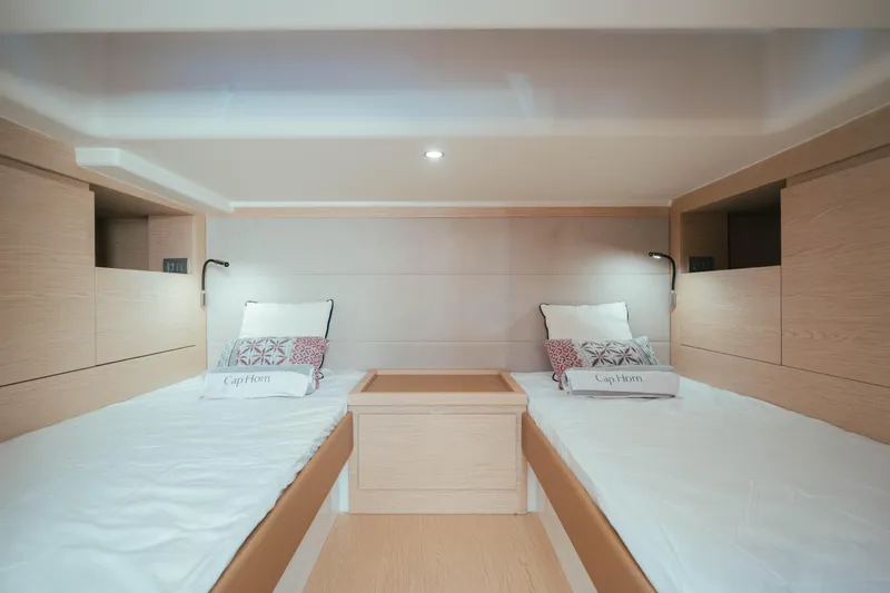  Yacht Photos Pics Luxurious twin cabin interior of 2023 Solaris Power 44 Open yacht.