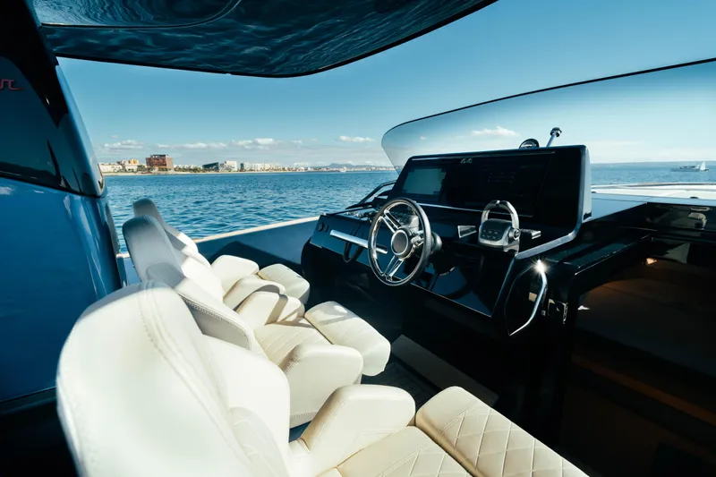  Yacht Photos Pics Interior view of 2023 Solaris Power 44 Open yacht cockpit with luxurious seating.