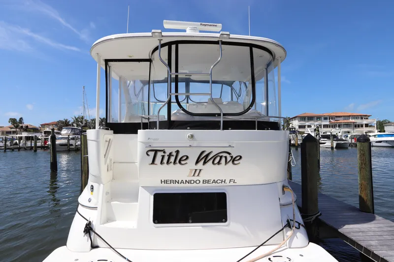  Yacht Photos Pics 2000 Cruisers Yachts 4450 Express Motoryacht docked at marina, Hernando Beach, FL.