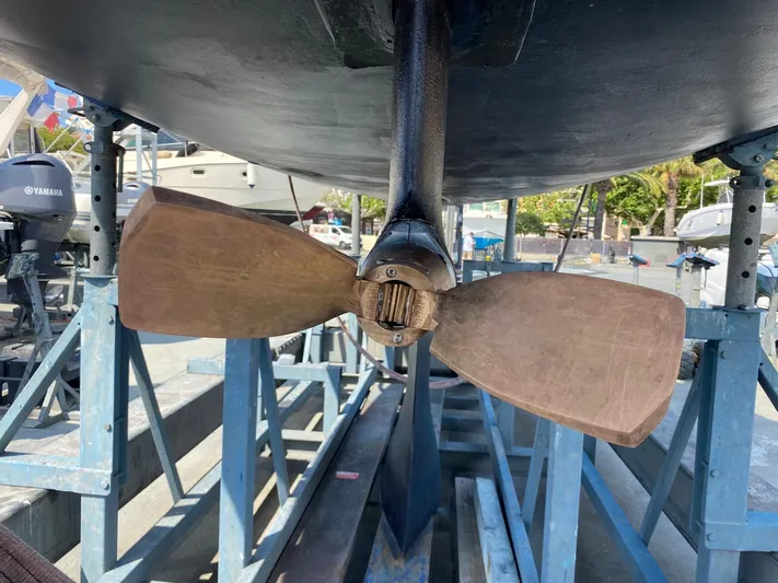  Yacht Photos Pics Propeller of 2006 Dufour 34 Performance sailboat on dry dock, showcasing marine engineering.