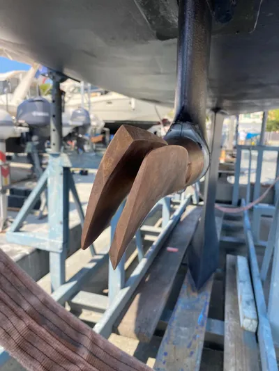  Yacht Photos Pics Close-up of a 2006 Dufour 34 Performance sailboat propeller in a boatyard.