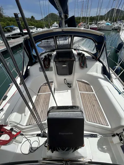  Yacht Photos Pics 2006 Dufour 34 Performance sailboat cockpit with teak flooring and navigation equipment.